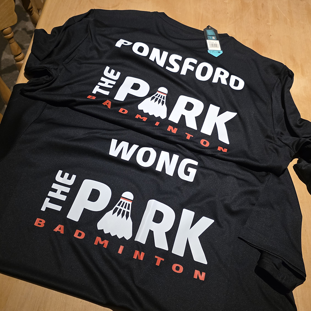Custom badminton club shirtts, featuring Park logo and players names.